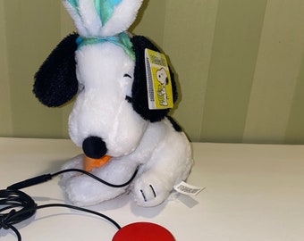 Switch adapted animated plush Hopping Snoopy. Speech therapy, occupational therapy, special needs education, assistive technology