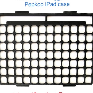 May include: Black plastic keyboard guard for an iPad case. The guard has a grid pattern with square holes. The text "AdaptedCreations.Etsy.com" is printed at the bottom of the image.