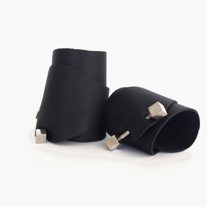 Embossed Black leather Wristband, Black Leather cuff that closes with a piercing, Adjustable cuff Bracelet