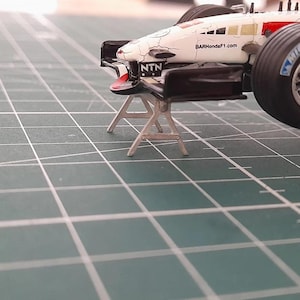 2x pairs 1:43 Scale Model Car display stands F1 or super cars made from metal