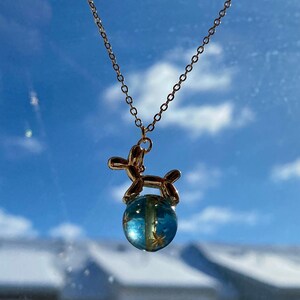 The Sky Blue planet bead is engraved with golden stars, offers a more translucent and captivating appearance.