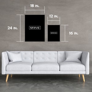 May include: Two black framed prints with the word "STRIVE" in white text. The larger print is 18 inches by 24 inches and the smaller print is 12 inches by 16 inches.