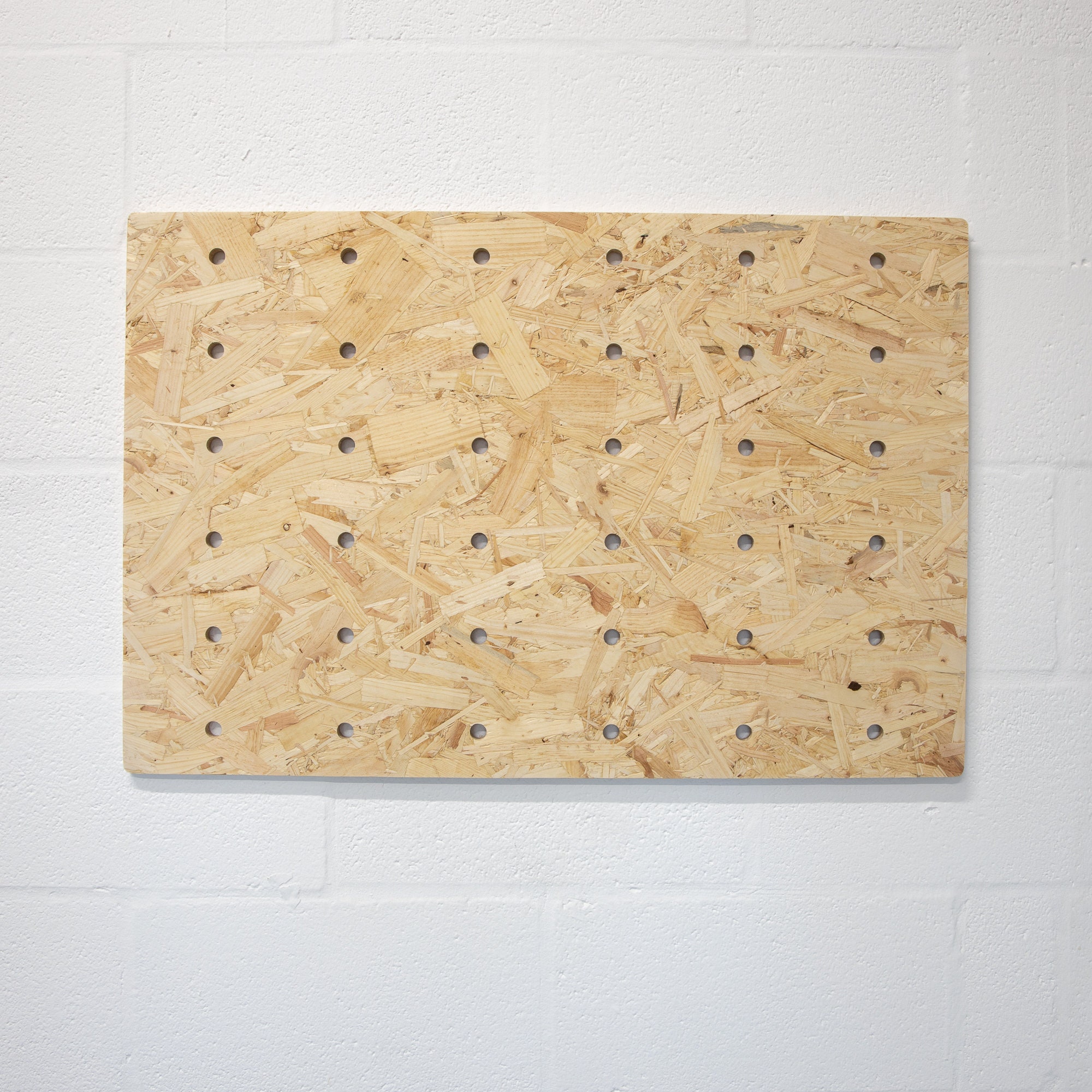 Wall Mounted Wooden OSB Pegboard and Organiser With Shelving and