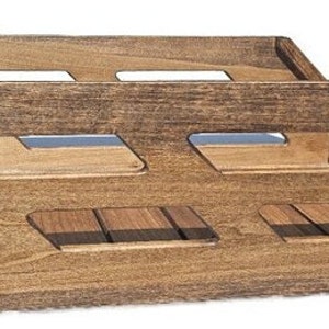 May include: A wooden storage crate with a dark brown stain. The crate has multiple open compartments and a slatted bottom.
