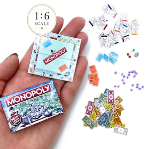 May include: A 1:6 scale miniature Monopoly board game set including a small game board, a box with the Monopoly logo, various paper money bills in different colors, small orange chance cards, blue property cards, purple houses, and a single die.