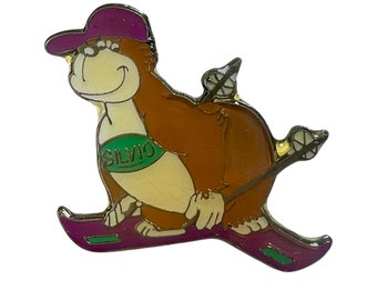 Vintage Cartoon Ski Pin: Retro Snow Sports Badge