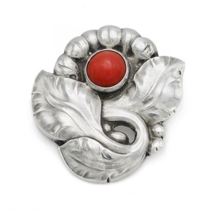 Georg Jensen art nouveau Sterling Silver floral brooch no 71 with a red coral.