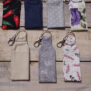 Chapstick holder with keychain attachment