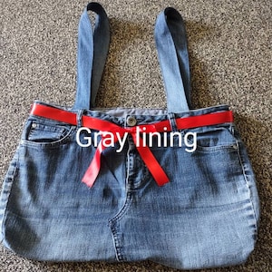 Upcycled denim bag with button closure
