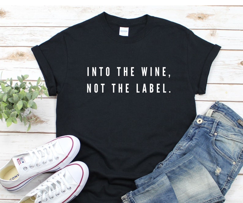 Top 27 Best Schitt's Creek Gifts from Etsy featured by top Seattle lifestyle blogger, Marcie in Mommyland: SCHITT'S CREEK TSHIRT Into The Wine Not The Label image 0