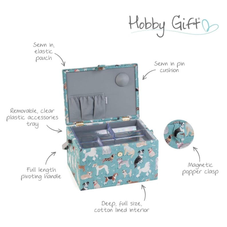 May include: A teal sewing box with a dog print, featuring a Hobby Gift logo, a magnetic popper clasp, a full-length pivoting handle, a removable clear plastic tray, a sewn-in elastic pouch, a sewn-in pin cushion, and a deep cotton-lined interior.