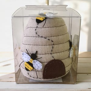 comes in a clear perspex box