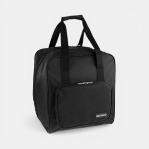 May include: A black travel bag with a rectangular shape and a top handle. The bag has a front pocket with a zipper and a small label. The bag is made of a durable material and is designed for carrying luggage.