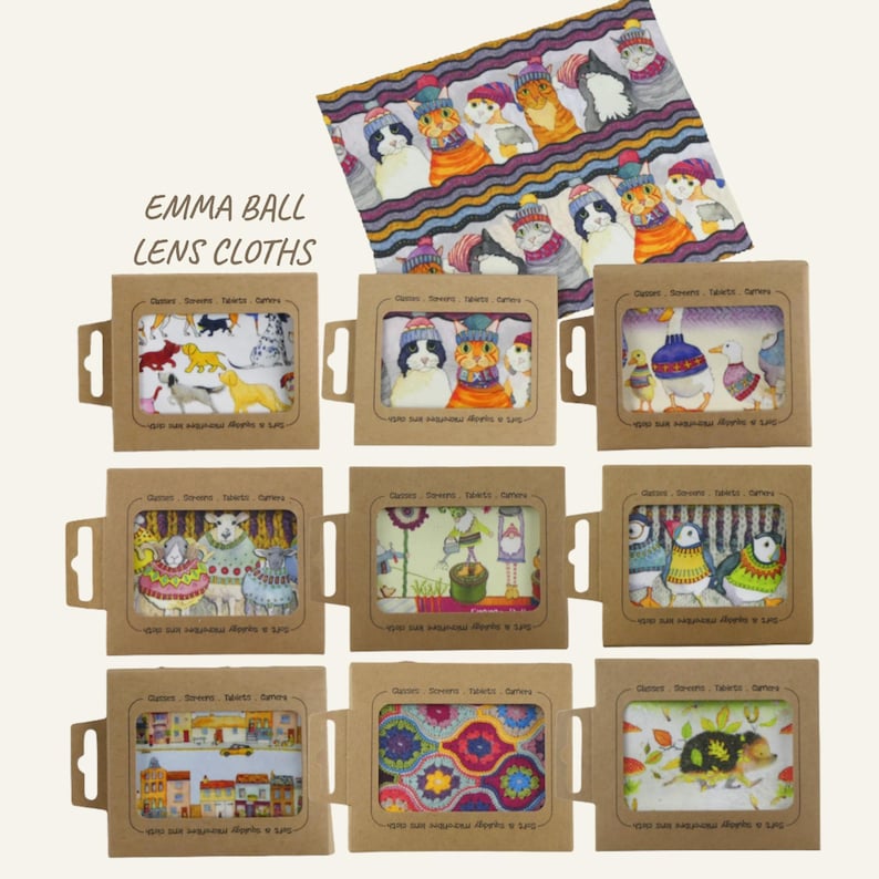 May include: Nine lens cloths in cardboard packaging, each with a unique illustrated design. The cloths feature various animal and floral patterns. The top cloth displays a repeating pattern of cats wearing hats. The text "EMMA BALL LENS CLOTHS" is visible.
