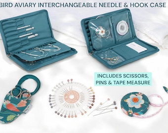May include: Teal Bird Aviary Interchangeable Needle & Hook Case, open to display knitting needles and accessories. Includes scissors, pins, and a tape measure. A bird-themed scissors case and a pinwheel are also visible.