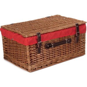 May include: A brown wicker picnic basket with a red fabric lining and a leather handle. The basket has two leather buckles on the front.