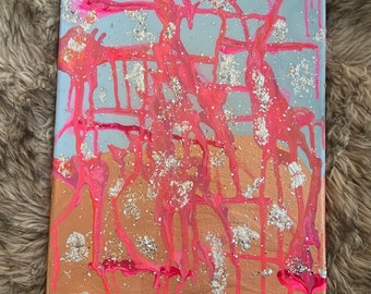 Titled “ Desert Moon Pink Skies” silver foil glitter pink pour painting with resin top coat