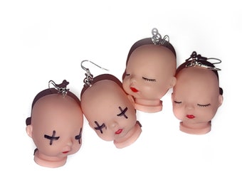 Boucles d'oreilles tête de poupée