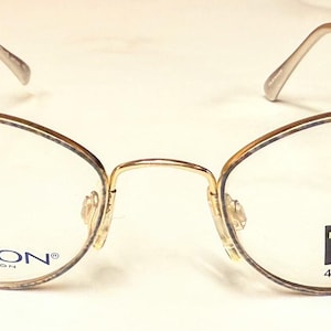 Marchon Flexon Magnetics 813 MAG Chestnut Eyeglasses Frames 46-18-135 Oval Brown Flexon Magnetics by Marchon 816 MAG Shiny Brown 46-18-135  main image 3