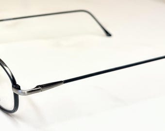 Gafas Claiborne vintage, nuevas, de stock antiguo, color negro/gris plomo, montura italiana descatalogada.