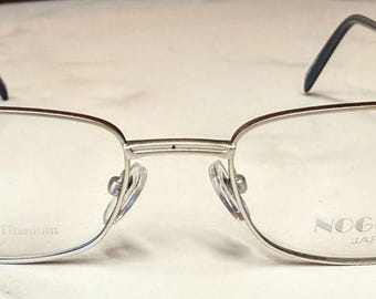 New Old Stock Vintage Noguchi titanium brillen zilver rechthoekig montuur stopgezet