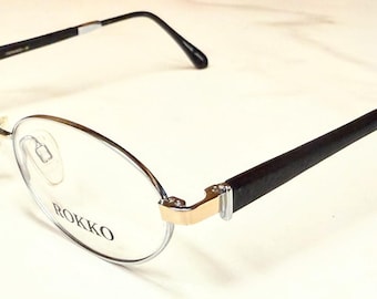 Gafas Rokko Vintage nuevas de stock antiguo, color plata/negro, modelo 6, montura descatalogada, fabricadas en Japón.
