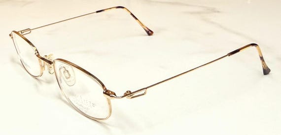 New Old Stock Vintage Synthes-Eyez by Charmant Eyeglasses Gold Lightweight Discontinued Frame
