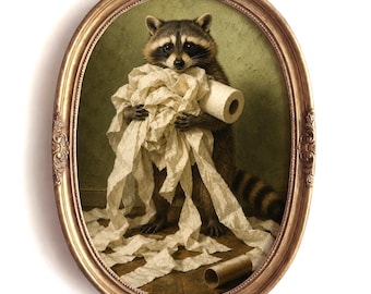 May include: An oval-framed wall art piece featuring a raccoon holding a large, unraveled roll of white toilet paper. The raccoon has dark fur around its eyes and a striped tail. An empty cardboard toilet paper tube lies on the floor below.