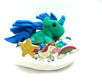 Blue and green unicorn ring tray and rings