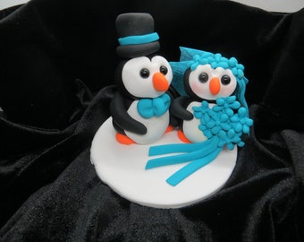 Teal bride and groom penguins / wedding anniversary cake topper