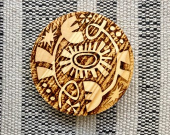 Vallende bloemen - kleine ronde houtgestookt