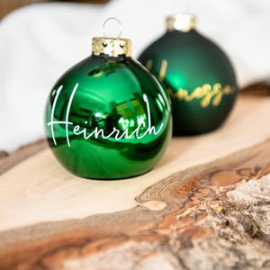 Stylish personalized Christmas bauble in real glass, shiny green