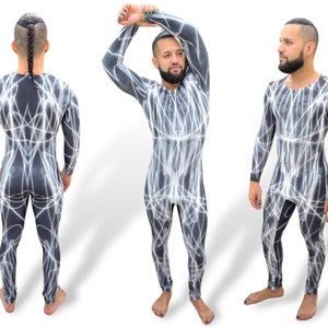 May include: A person wearing a black and white patterned one-piece suit with long sleeves and a high neck. The suit has a white abstract design that resembles lightning bolts.
