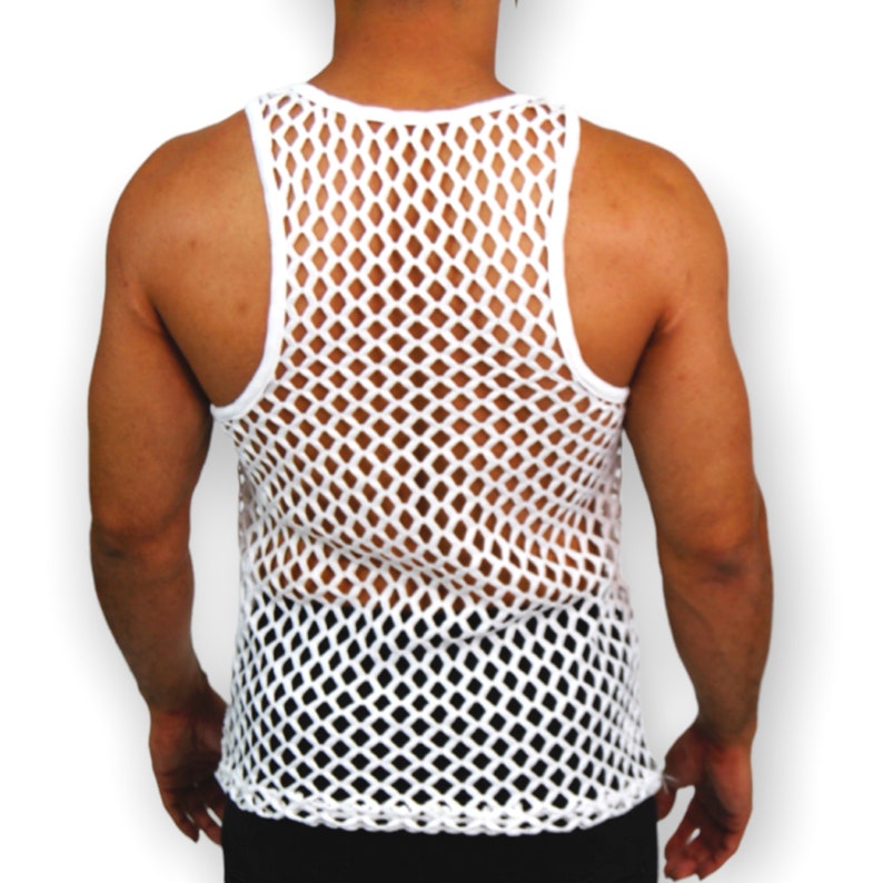 May include: White, open-weave tank top. The sleeveless shirt features a diamond-shaped mesh design. The tank top has a rounded neckline and a straight hemline. The garment is made of a lightweight material.