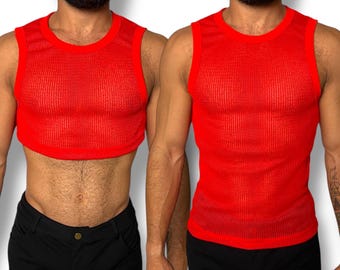 May include: Two red mesh tank tops. One is a cropped style, and the other is a standard length. Both tops have a round neckline and a ribbed texture. The models are wearing black trousers.