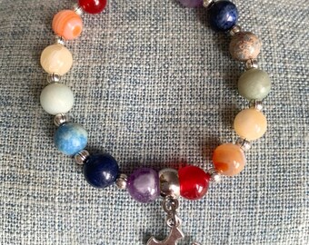 Rainbow gemstone crystal bracelet with puzzle piece charm - autism awareness piece