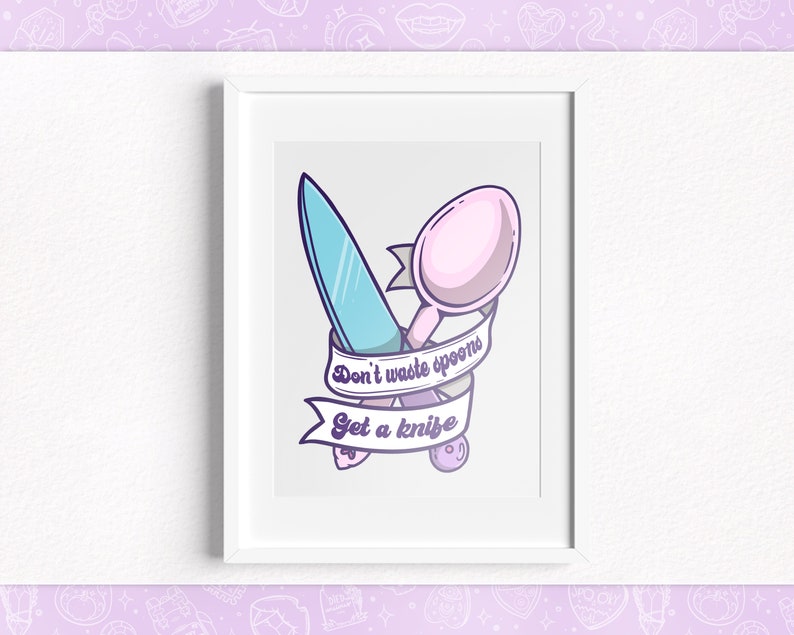 May include: A white framed print with a blue knife and pink spoon crossed over each other. A purple and white ribbon with the text "Don't waste spoons Get a knife" is wrapped around the utensils.