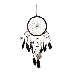 May include: A brown dreamcatcher with black feathers hanging from it. The dreamcatcher has a circular design with a web-like pattern and four smaller circles hanging from it.