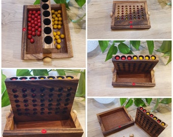 Four in a row made of wood, travel game
