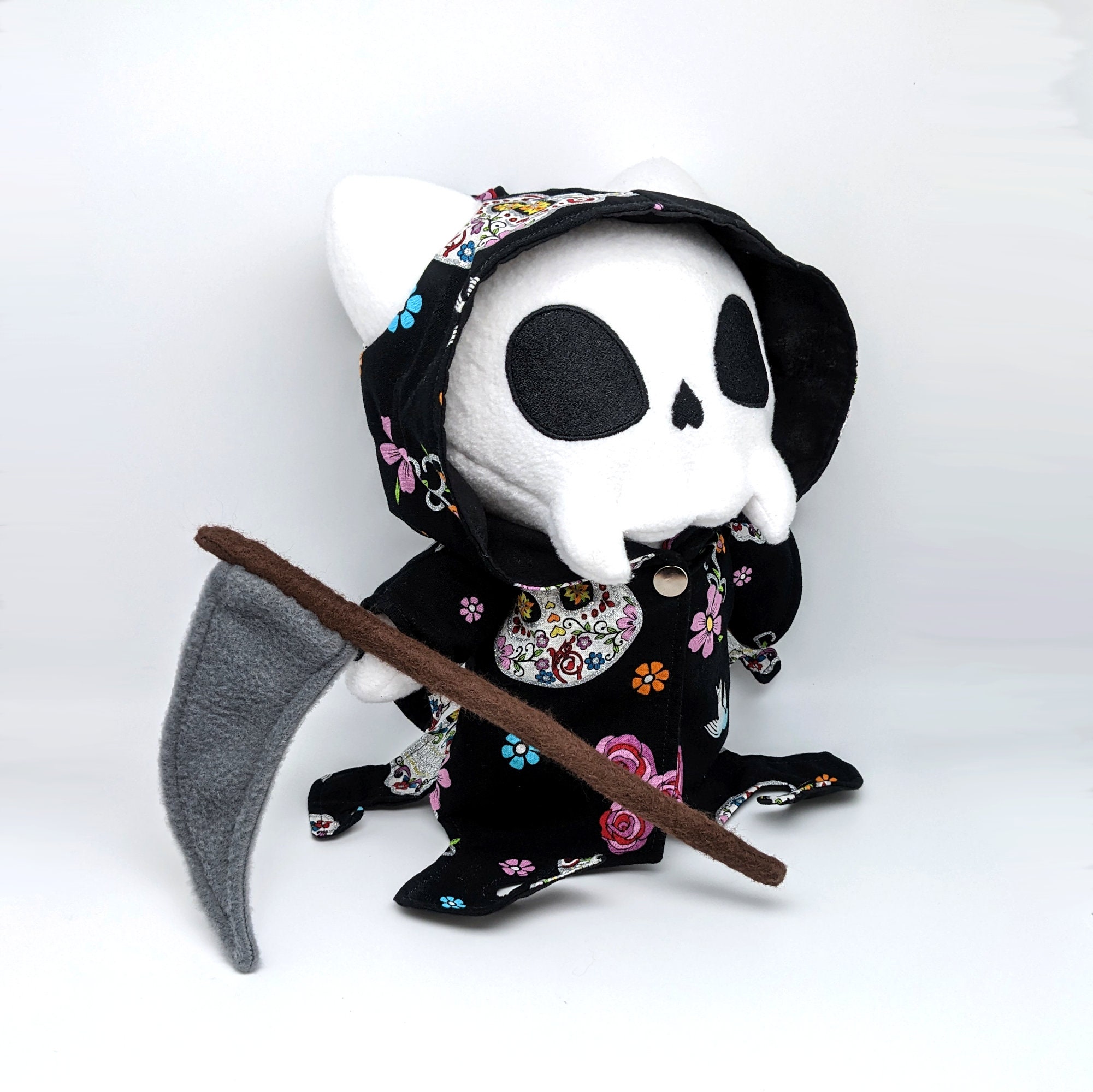 Dolls Kill Hello Kitty Skeleton Plush Backpack - Black