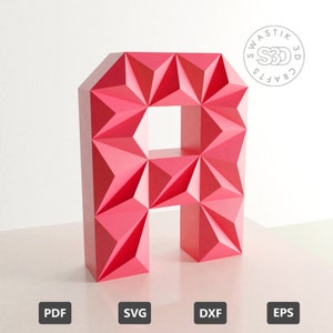 Puede incluir: Un modelo de papelcraft 3D imprimible de la letra A. La letra está compuesta por una serie de triángulos y es de color rosa brillante. El modelo está diseñado para ser ensamblado a mano y es un proyecto divertido y creativo para personas de todas las edades.