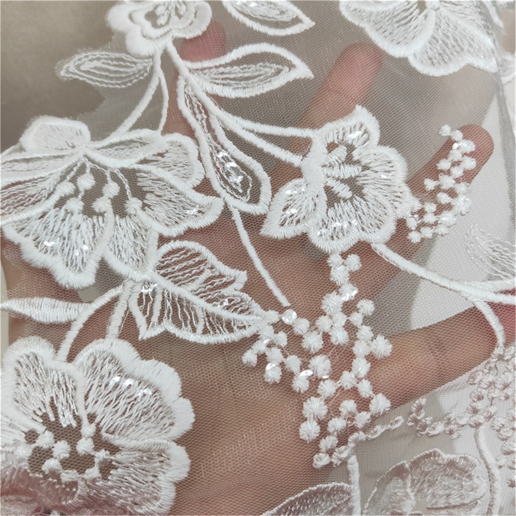 plunging lace wedding gown with floral applique