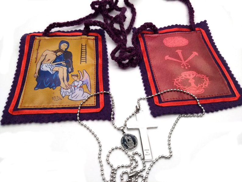 Mariejulie Jahenny, Purple Catholic Scapular, Cross and Good Counsel Medal