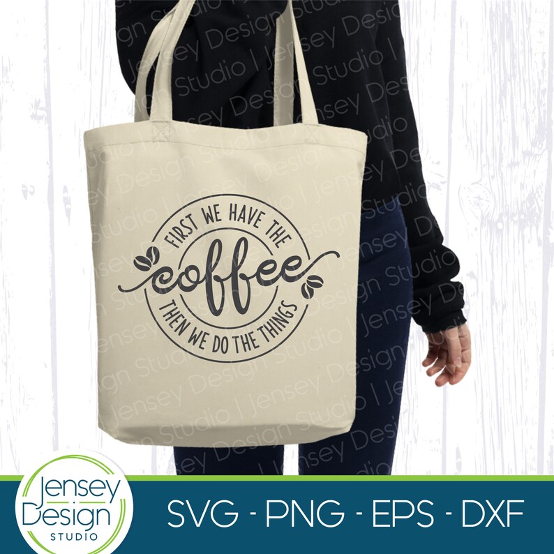 May include: A white tote bag with a black graphic that reads "First we have the coffee then we do the things". The graphic is in a circle with coffee beans on either side.