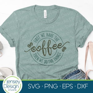 May include: A light blue t-shirt with a green circle graphic that says "First we have the coffee then we do the things".