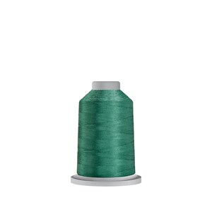 May include: A spool of teal-colored thread, ideal for sewing and embroidery projects. The thread is tightly wound on a white plastic base with a gray top. The thread has a shiny, smooth texture, perfect for various crafting applications.