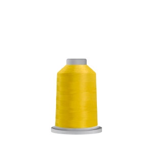 May include: A spool of bright yellow thread for sewing or embroidery.