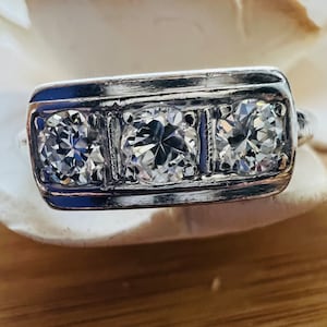 Petite vintage Art Deco platinum .51ctw transitional brilliant diamond three stone ring