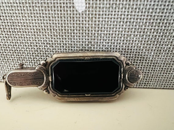 Lorgnette a pair of spectacles with a handle. - image 8