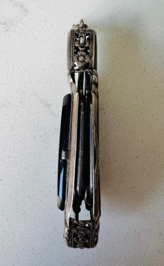 Lorgnette a pair of spectacles with a handle. - image 2